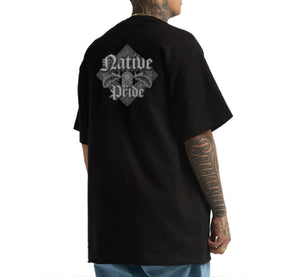 Person wearing a black t-shirt with 'Native Pride' design on the back, standing against a white background.