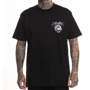 Person wearing a black t-shirt with a logo on a white background