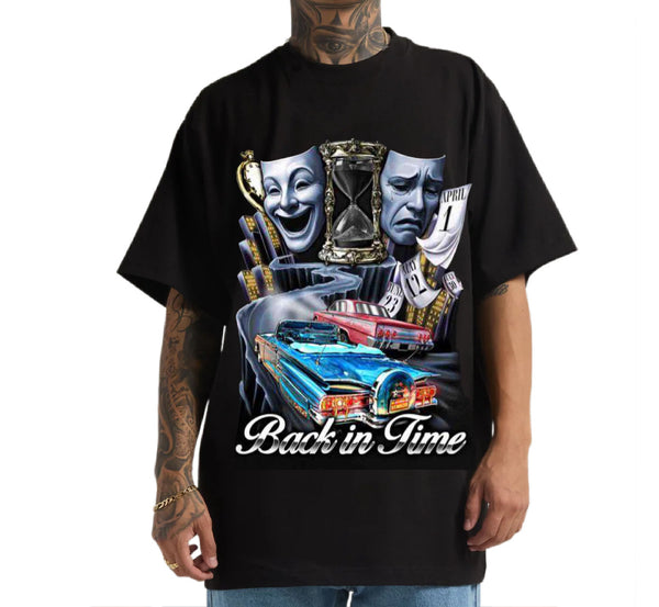Black t-shirt with a graphic design featuring a car, masks, and text 'Back in Time' on a white background.